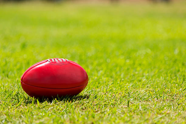 Australian Rules football on grass